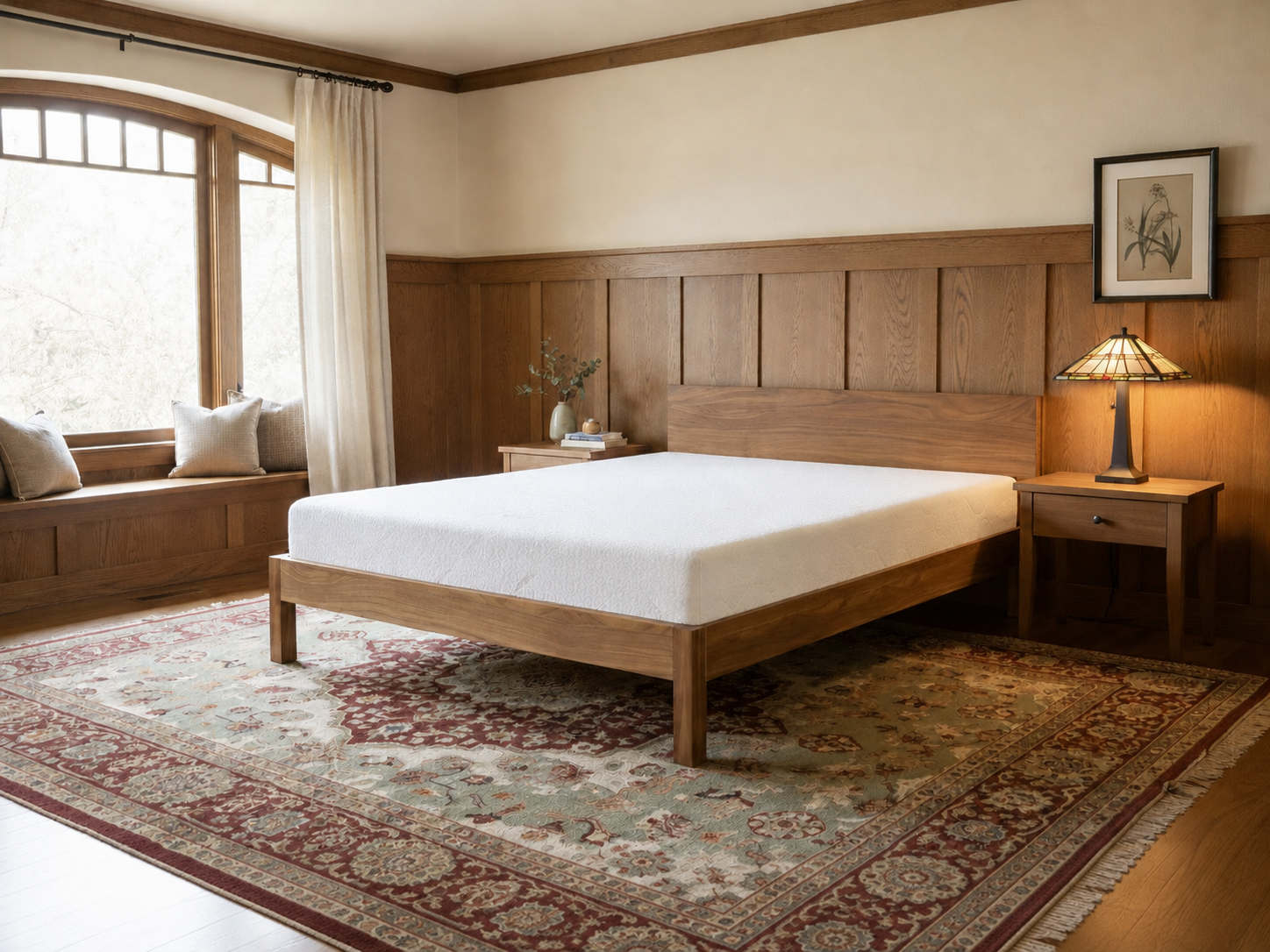 Sahara Bed in solid walnut with wide low-profile panel headboard, styled in a warm craftsman bedroom with Persian rug, wood wainscoting, and Tiffany-style lamp