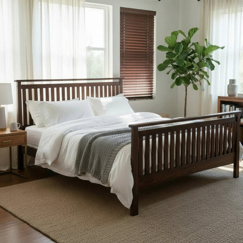MissionCraft Furniture Atena solid walnut hardwood platform bed with slatted headboard and footboard in a bedroom