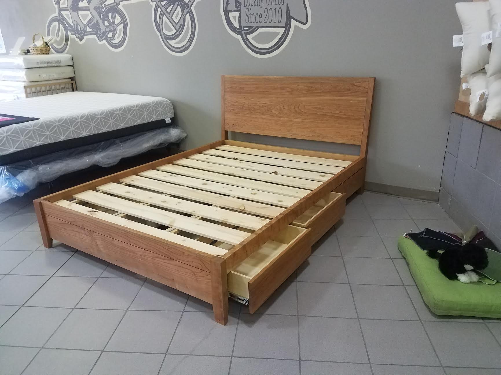MissionCraft Furniture Portland Studio solid hardwood platform bed with an angled headboard and under-bed storage