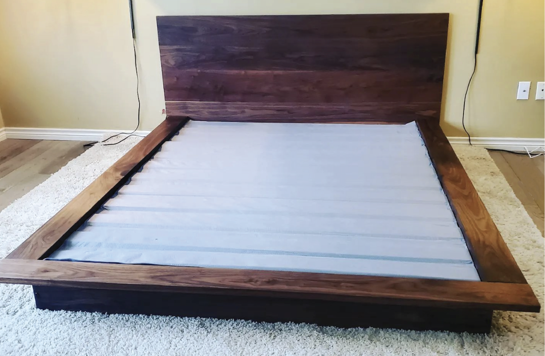 MissionCraft Furniture Oregon solid walnut hardwood platform bed with a minimalist low-profile headboard design.