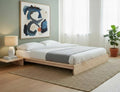 MissionCraft Furniture Pacifica platform bed in light hardwood with a minimalist low-profile design in a modern bedroom