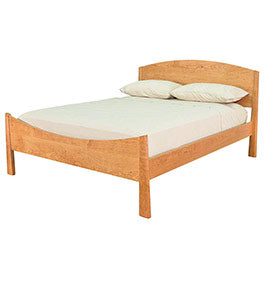 MissionCraft Furniture New England Shaker platform bed in solid hardwood with a classic curved headboard design.