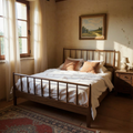 MissionCraft Furniture solid hardwood spindle platform bed with headboard and footboard in a sunlit bedroom.
